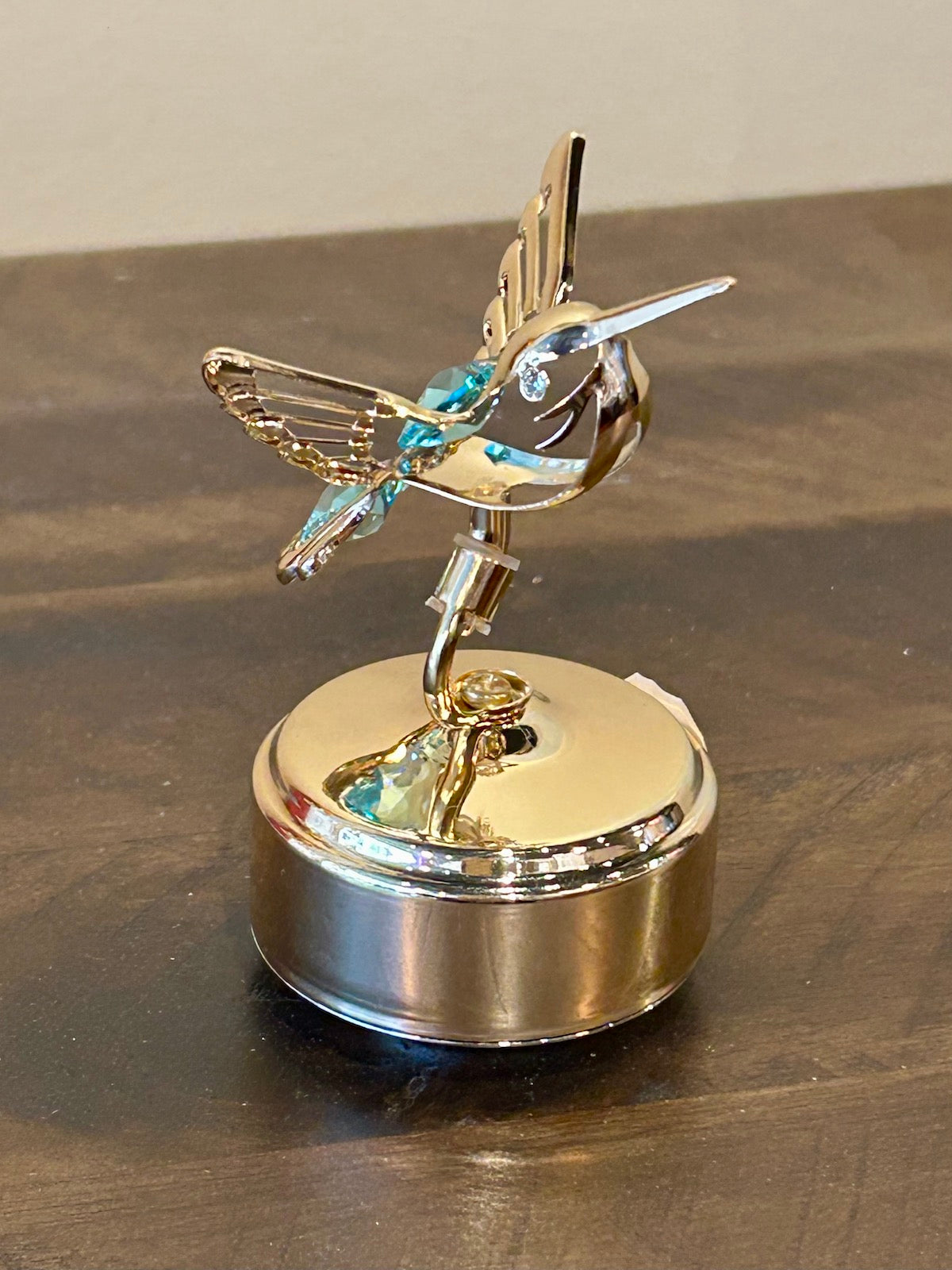 24k Gold Plated Revolving Musical Hummingbird with Green Swarovski Crystals