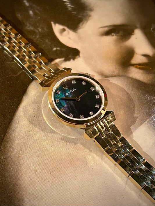 Bulova Ladies Regatta Gold, Diamond & Black Mother of Pearl Watch