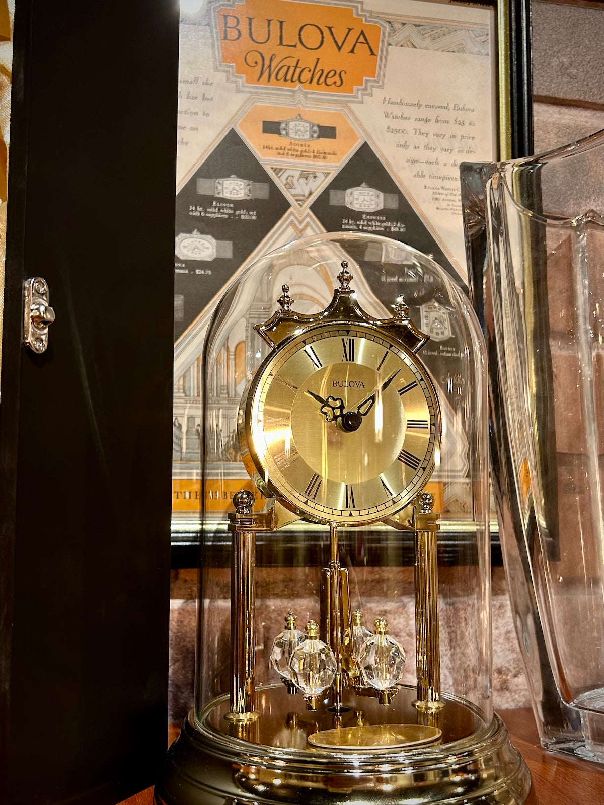 Bulova Tristan Dome Rotating Pendulum Gold Clock