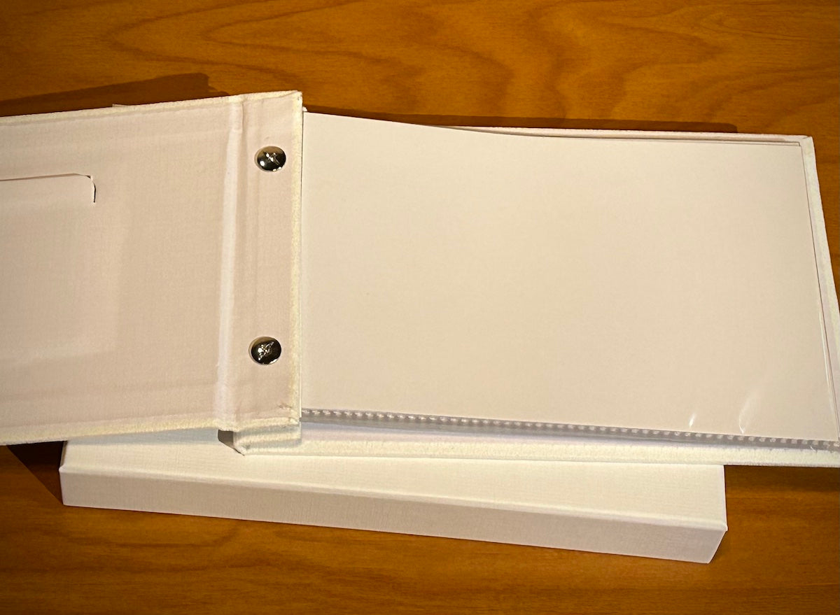 White Photo Album with Silver Bow