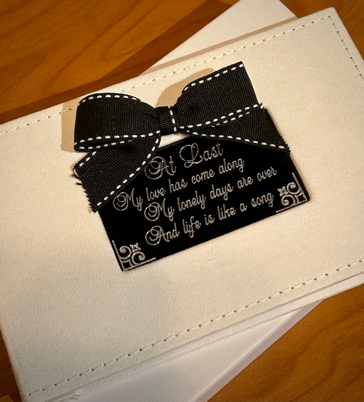 White Photo Album with Black Bow