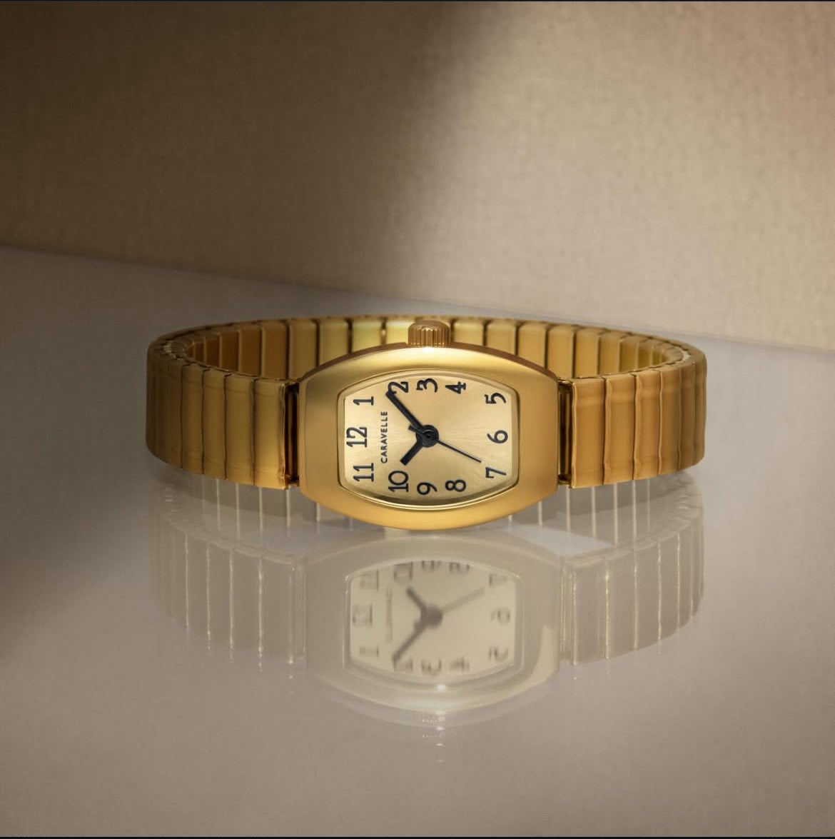 Caravelle by Bulova Ladies Traditional Gold Watch with Expansion Bracelet