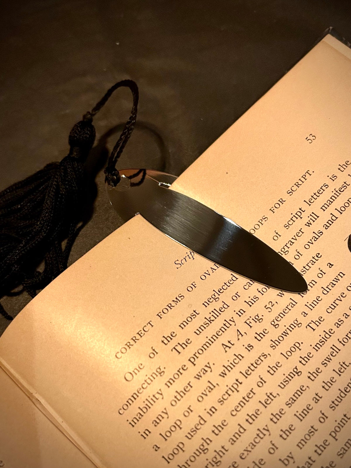 Silver Oval Bookmark with Black Tassel