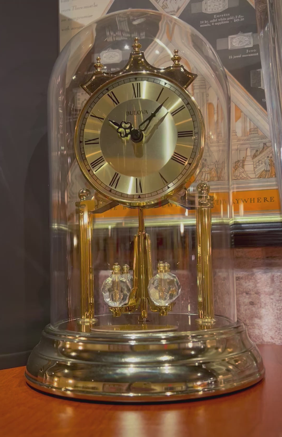 Bulova Tristan Dome Rotating Pendulum Gold Clock – Unforgettable